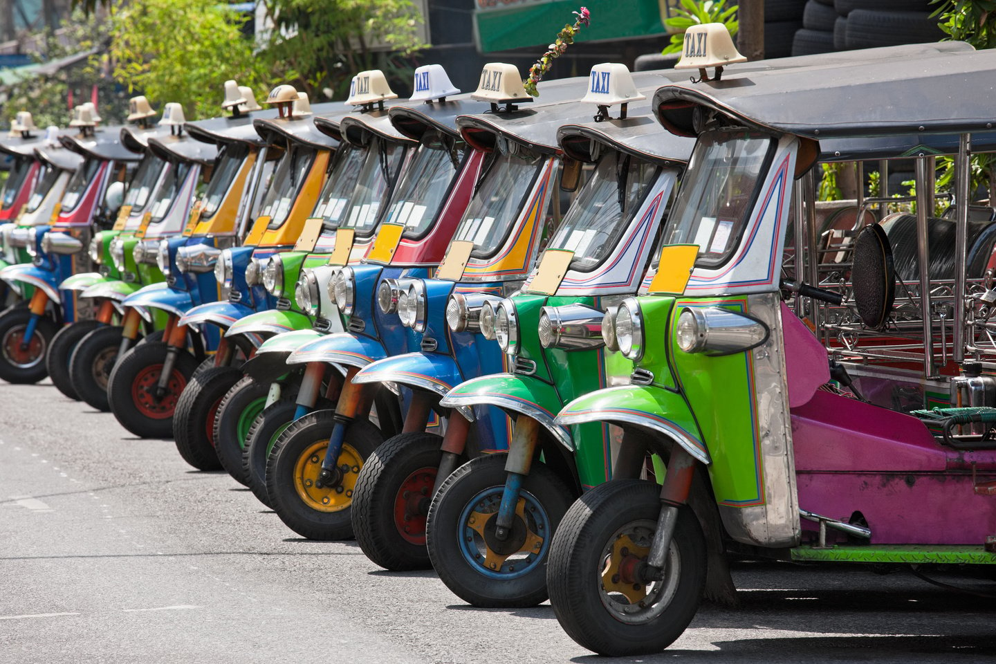 Row of Thai Tuk-tuks.